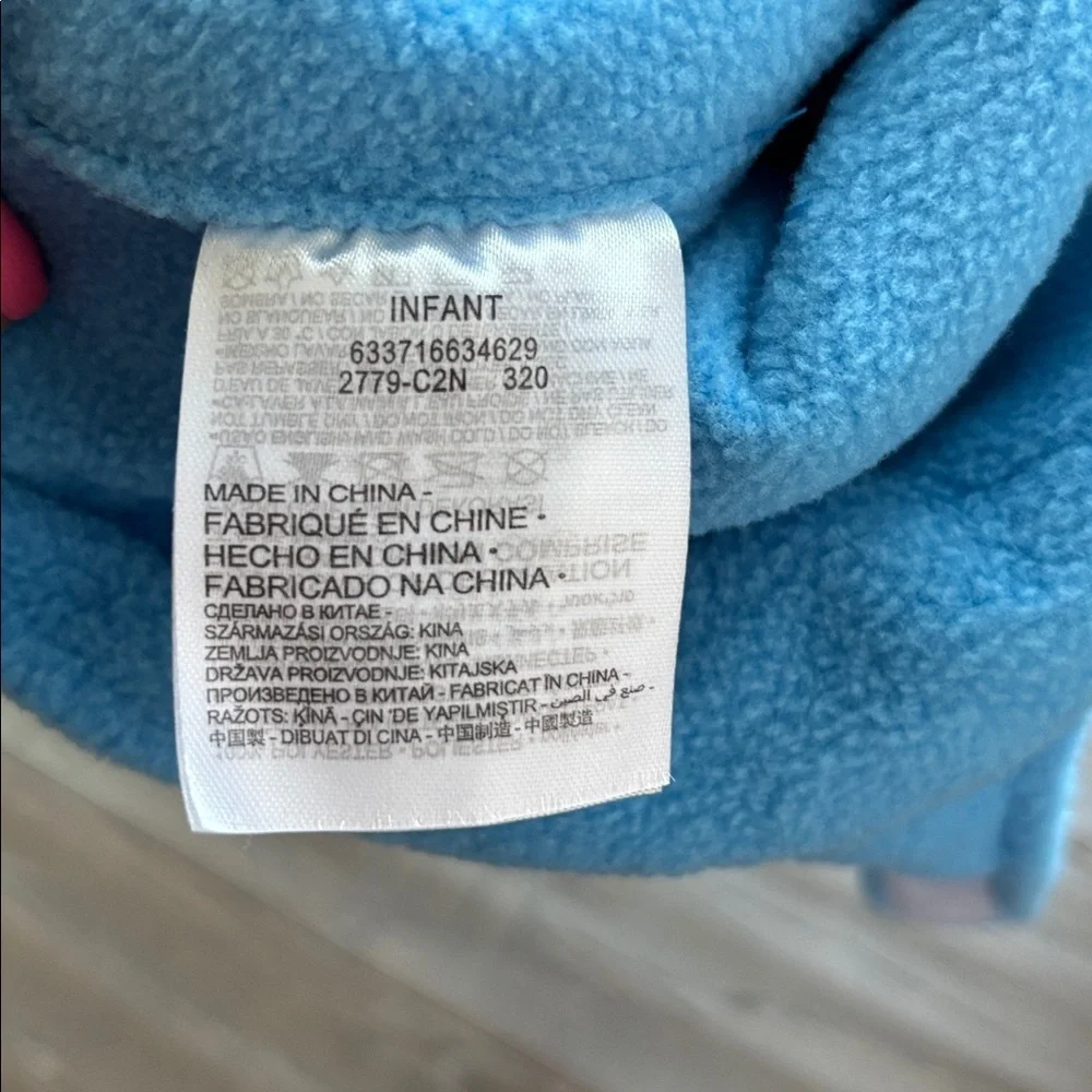 Nike Infant 2pc earflap/trapper hat & mitten,fleece,tonal logo,velcro chin strap